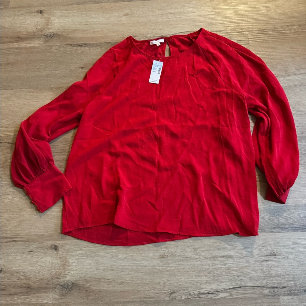 Maurice’s ladies large red dress shirt with slits in the arms & buttons on cuff.